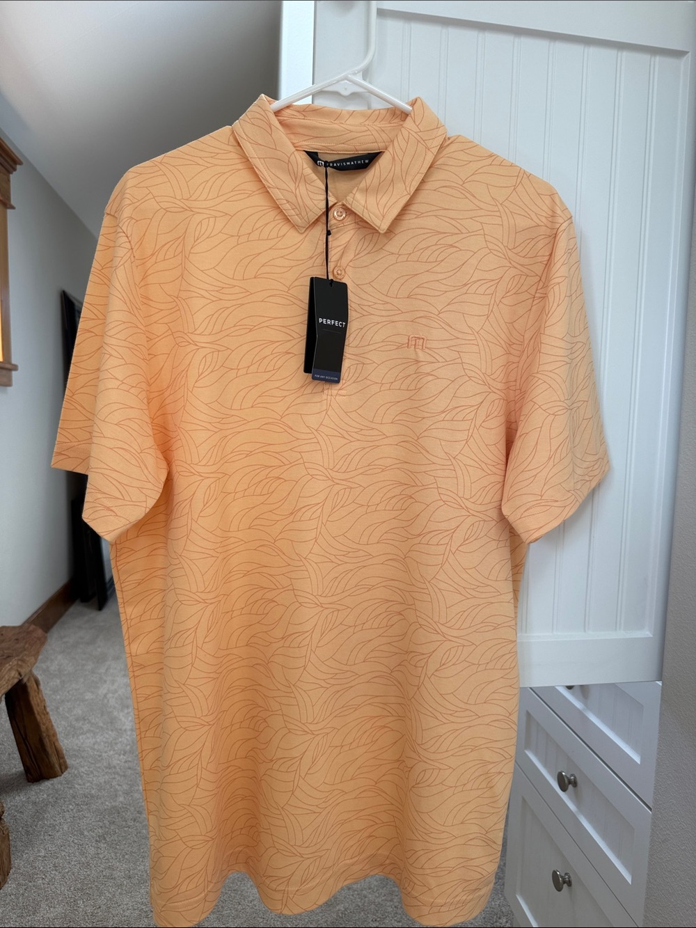 Brand new Travis Mathew polo. Size large!
